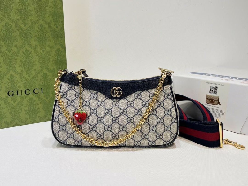 G*u*i top handle bags